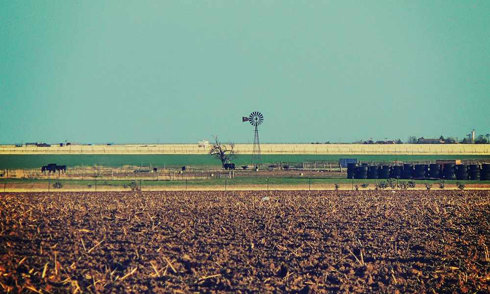 windmill water pump on open West Texas pasture